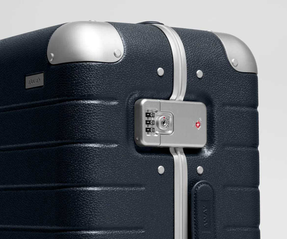 The Aluminum Edge Bigger Carry-On in Navy Blue
