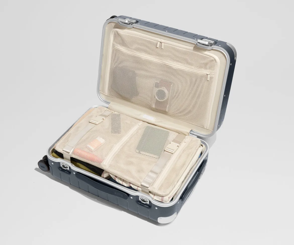 The Aluminum Edge Bigger Carry-On in Navy Blue